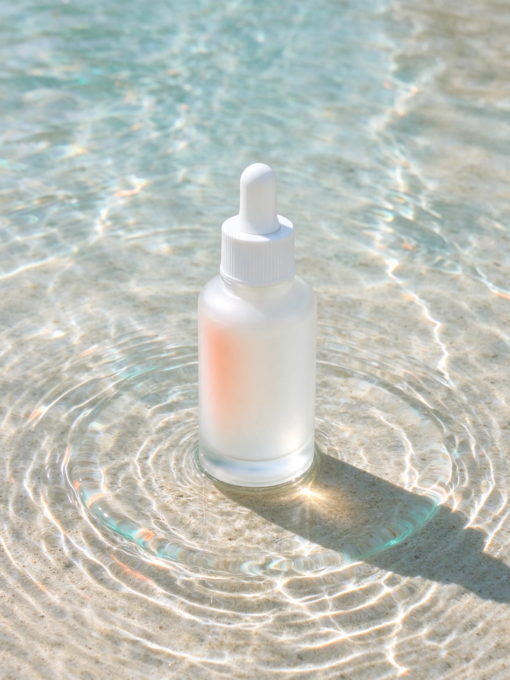 Serum Bottle in Rippling Water